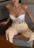 milk-colored corset, strapless ivory corset, semi-transparent ivory corset, milk corset with mesh inserts, elegant ivory corset, modern milk-colored corset, ivory strapless corset, milk corset with bold cutouts, semi-sheer ivory corset, soft ivory corset design, milk white corset, ivory corset with back zipper, milk-colored bustier, sleek ivory corset, neutral-tone corset, corset with mesh details, strapless semi-transparent corset, feminine ivory corset, minimalist milk corset, timeless ivory corset, ivory